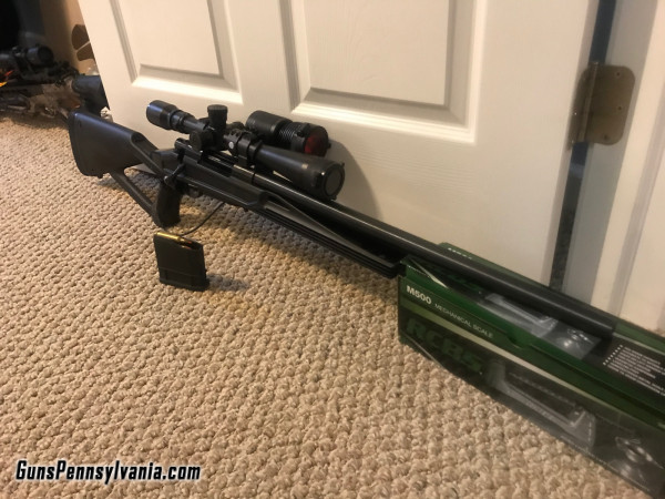 22-250 Howa talon predator rifle with scope and red lite